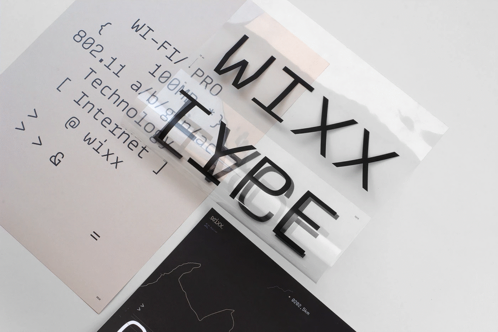 Close-up of Wixx Telecom custom typeface letters in use.